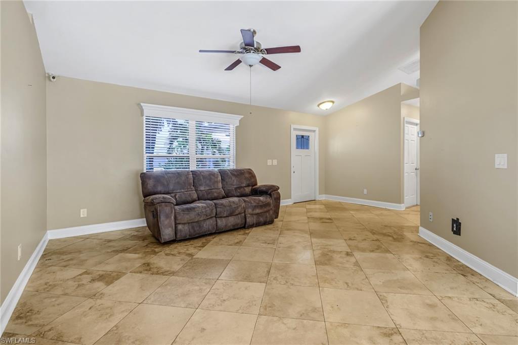 8116 Sandpiper Road Fort Myers, FL 33967 - Photo 10 of 29 Tiled living room with ceiling fan