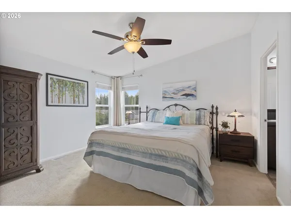 a view of empty room with ceiling fan