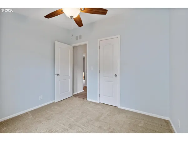 a view of a backyard with sitting area