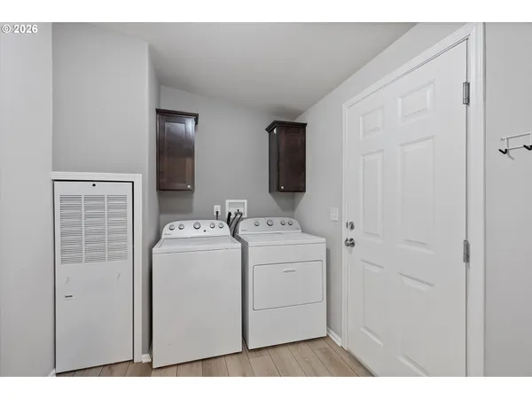 an aerial view of a house with a swimming pool