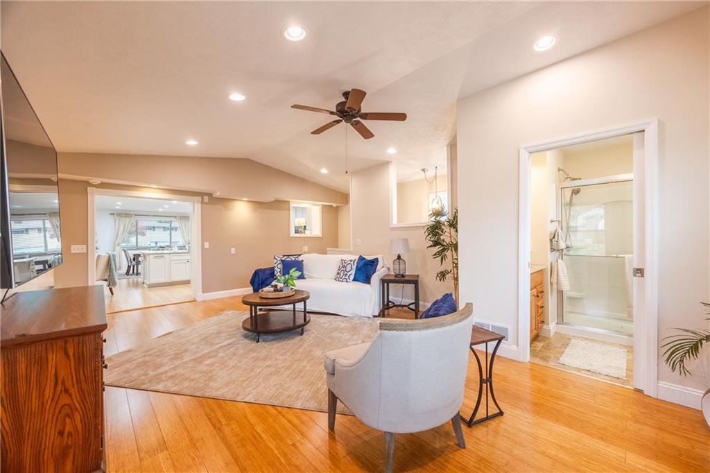 430 Amherst Avenue Coraopolis, PA 15108 - Photo 11 of 33 a dining room with furniture wooden floor and a chandelier