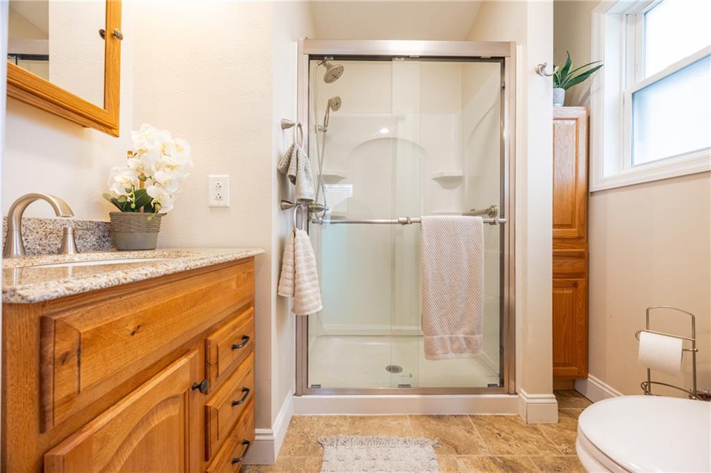 430 Amherst Avenue Coraopolis, PA 15108 - Photo 12 of 33 a bathroom with a granite countertop sink toilet and shower