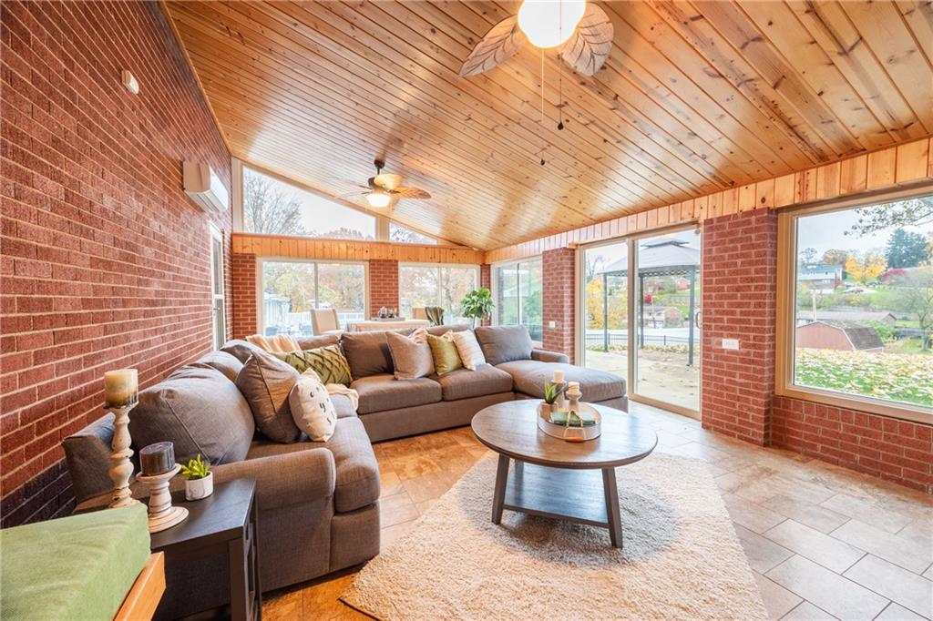 430 Amherst Avenue Coraopolis, PA 15108 - Photo 20 of 33 a living room with furniture a window and a table