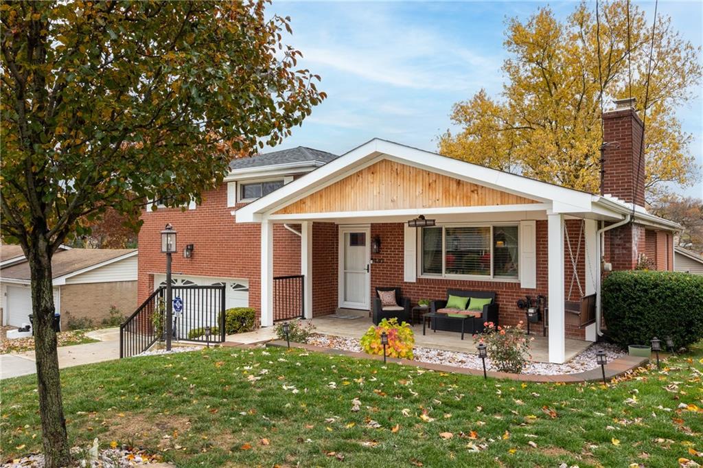 430 Amherst Avenue Coraopolis, PA 15108 - Photo 3 of 33 a front view of house with yard outdoor seating and green space