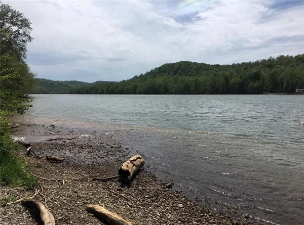 a view of lake with mountain