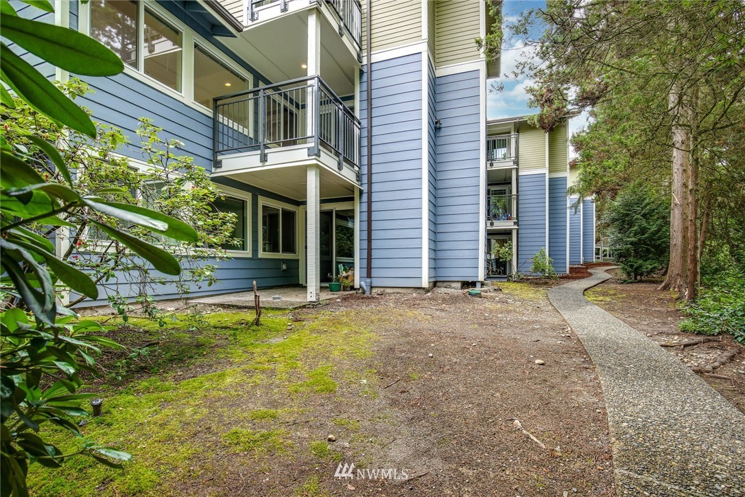 7571 Old Redmond Road, Unit 11 Redmond, WA 98052 - Photo 23 of 27 a view of a house with a swimming pool