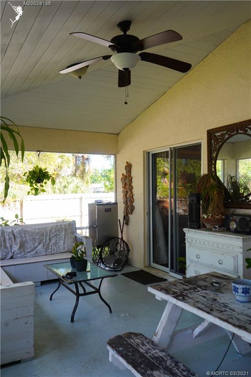 7302 Santa Rosa Parkway Fort Pierce, FL 34951 - Photo 33 of 33 a living room with furniture and a window