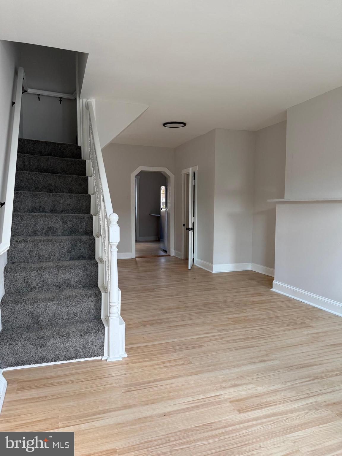 1263 South Merrimac Road Camden, NJ 08104 - Photo 3 of 16 a view of entryway and hall with wooden floor