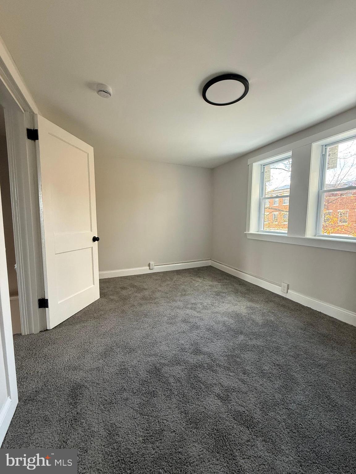 1263 South Merrimac Road Camden, NJ 08104 - Photo 10 of 16 an empty room with windows