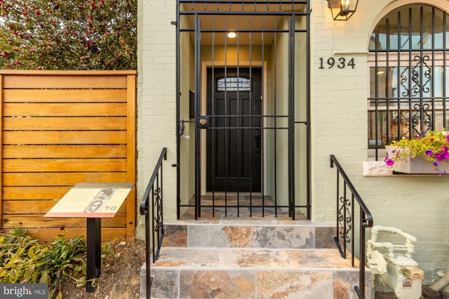 a view of balcony with a potted plant