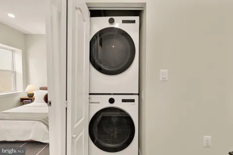 a picture of a bathroom with a shower
