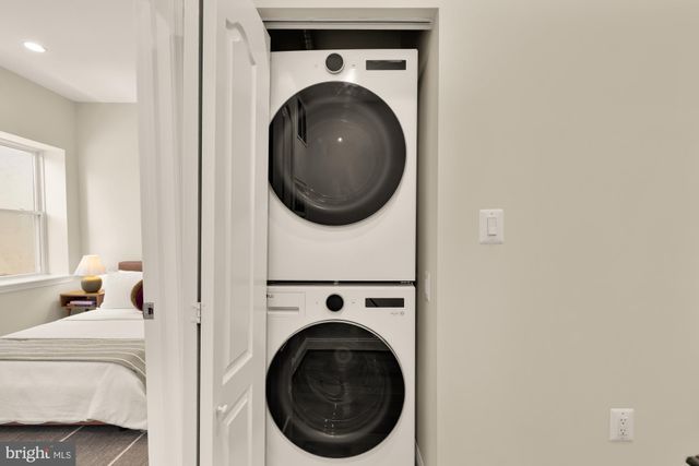 a picture of a bathroom with a shower