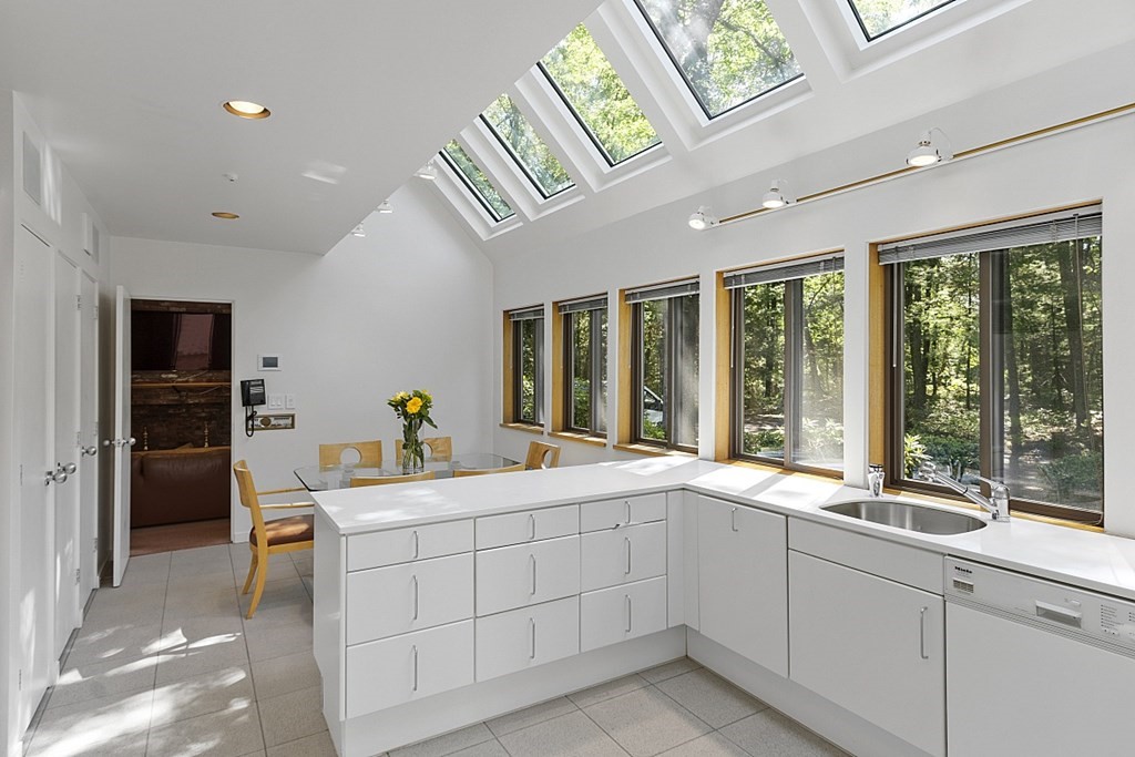 70 Davison Drive Lincoln, MA 01773 - Photo 12 of 37 a room with a bed and a large window