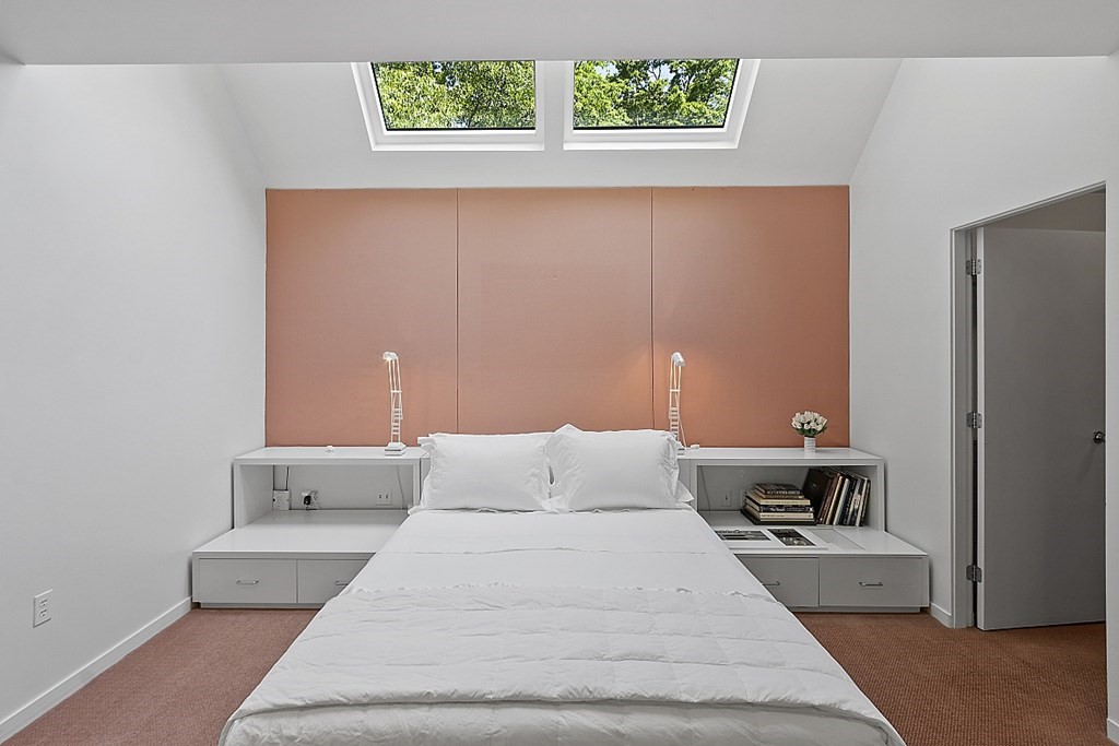 70 Davison Drive Lincoln, MA 01773 - Photo 15 of 37 a large white bed in a white room