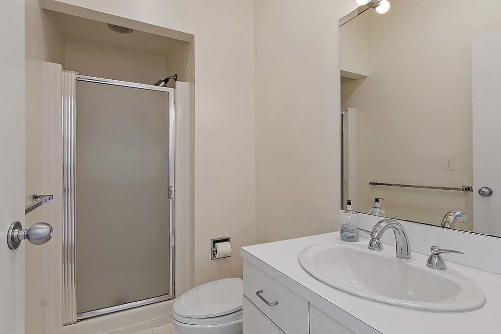 70 Davison Drive Lincoln, MA 01773 - Photo 24 of 37 a bathroom with a sink toilet and shower