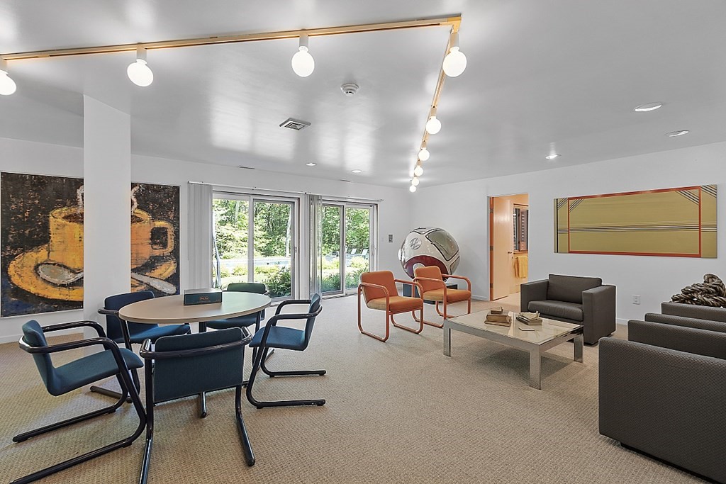 70 Davison Drive Lincoln, MA 01773 - Photo 25 of 37 a living room with furniture and a large window