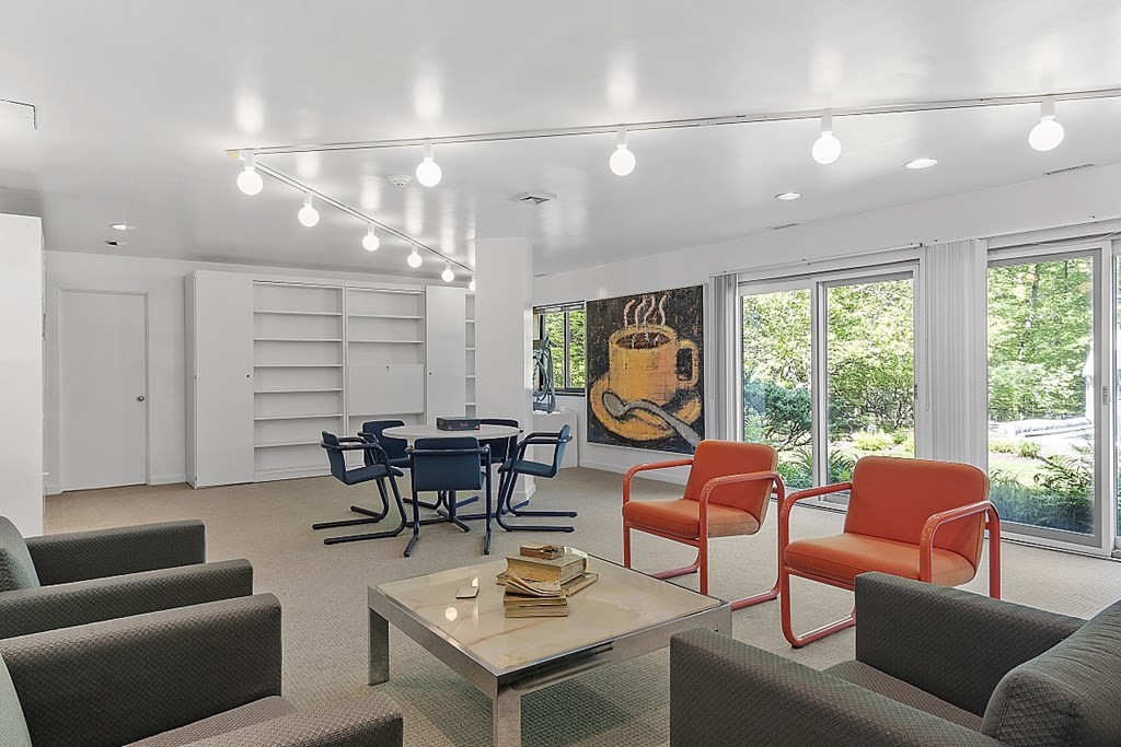 70 Davison Drive Lincoln, MA 01773 - Photo 26 of 37 a living room with furniture and a large window