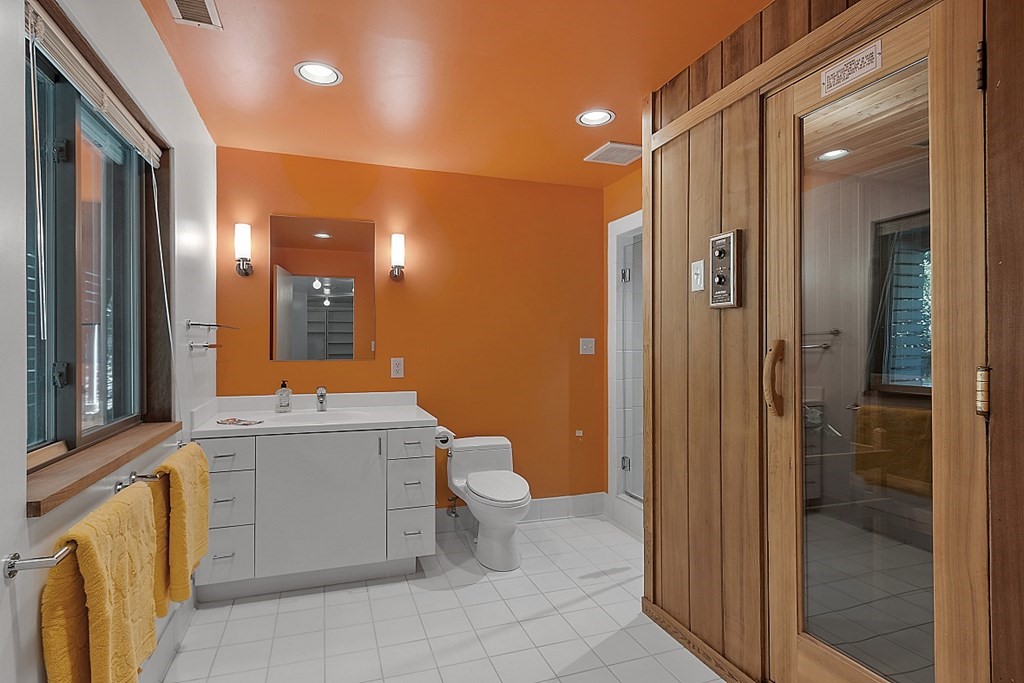 70 Davison Drive Lincoln, MA 01773 - Photo 27 of 37 a bathroom with a sink a toilet and shower