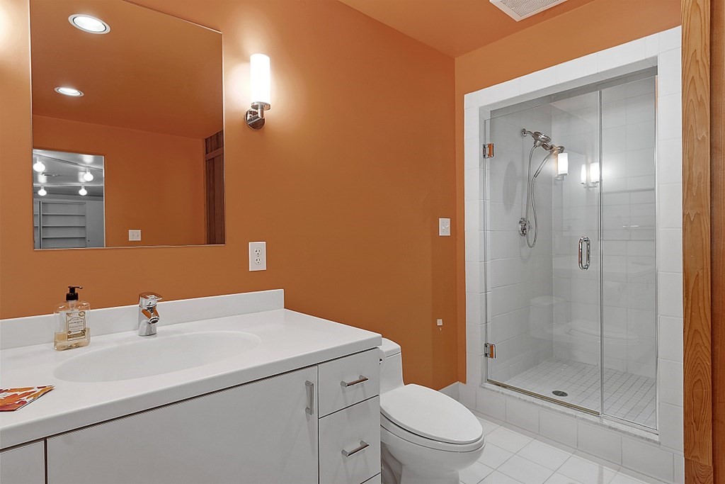 70 Davison Drive Lincoln, MA 01773 - Photo 29 of 37 a bathroom with a sink a toilet and shower