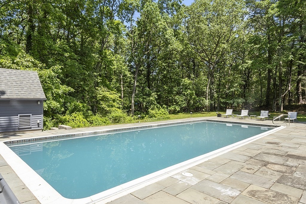 70 Davison Drive Lincoln, MA 01773 - Photo 35 of 37 a view of a swimming pool with an outdoor space