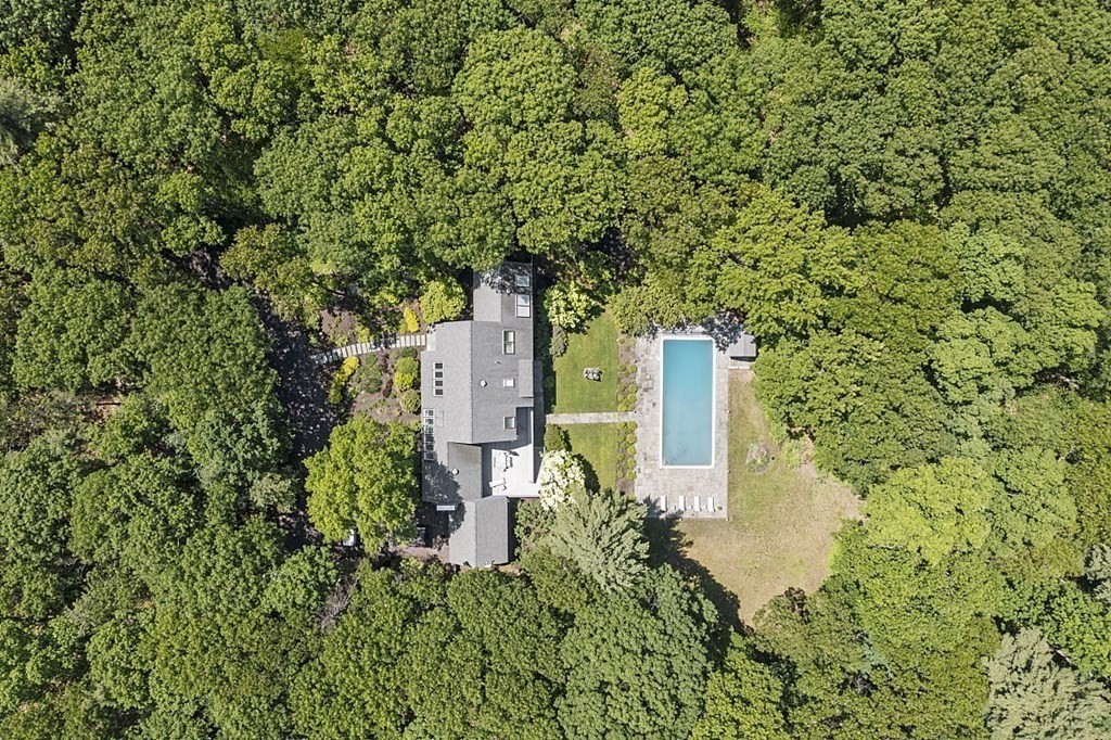 70 Davison Drive Lincoln, MA 01773 - Photo 36 of 37 a backyard of a building with trees