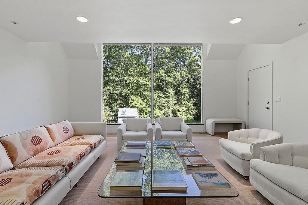 70 Davison Drive Lincoln, MA 01773 - Photo 4 of 37 a living room with furniture and a large window