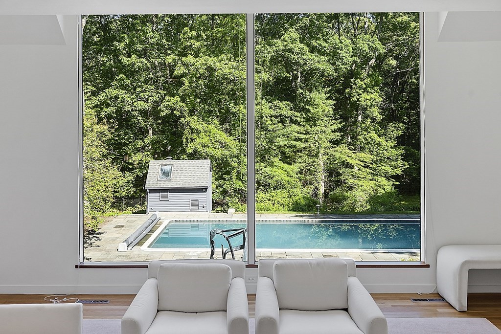 70 Davison Drive Lincoln, MA 01773 - Photo 5 of 37 swimming pool view with a outdoor seating space