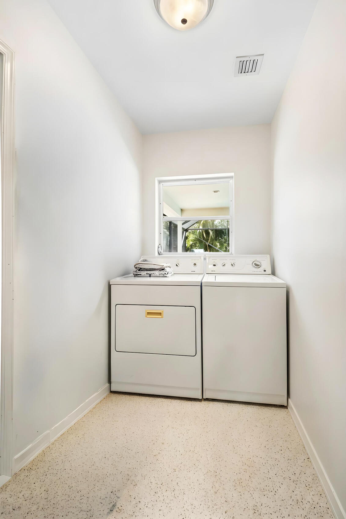 1348 Southwest 4th Street Boca Raton, FL 33486 - Photo 23 of 44 a utility room with dryer and washer