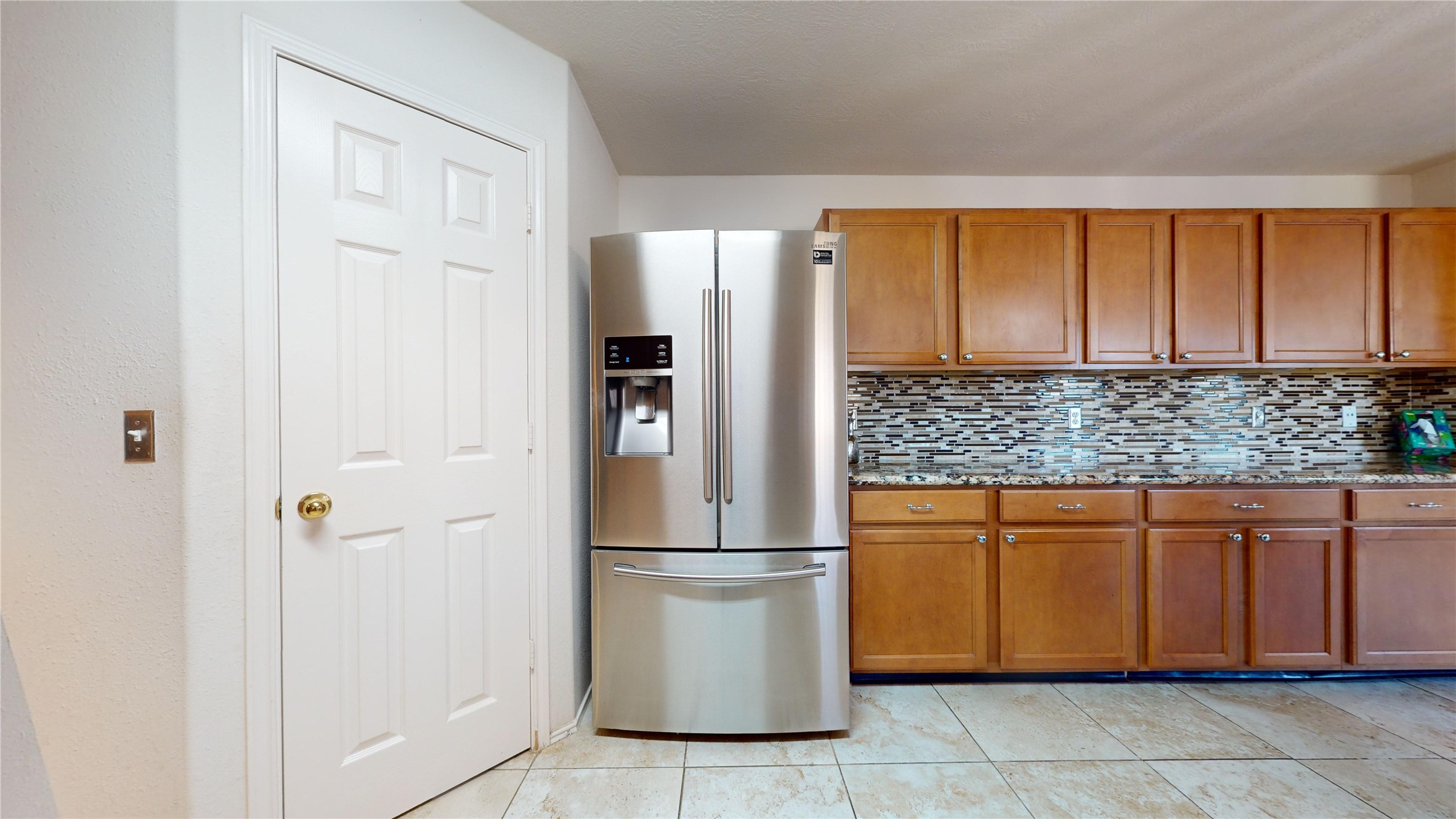 18226 Thicket Grove Road Houston, TX 77084 - Photo 13 of 45 a kitchen with stainless steel appliances granite countertop a refrigerator and a sink