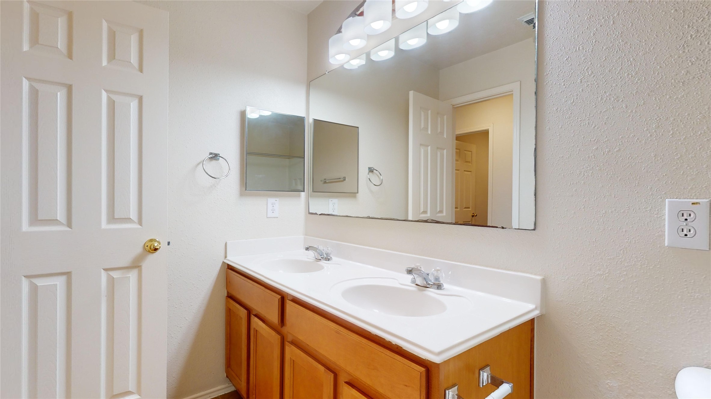 18226 Thicket Grove Road Houston, TX 77084 - Photo 18 of 45 a bathroom with a sink double vanity and a mirror