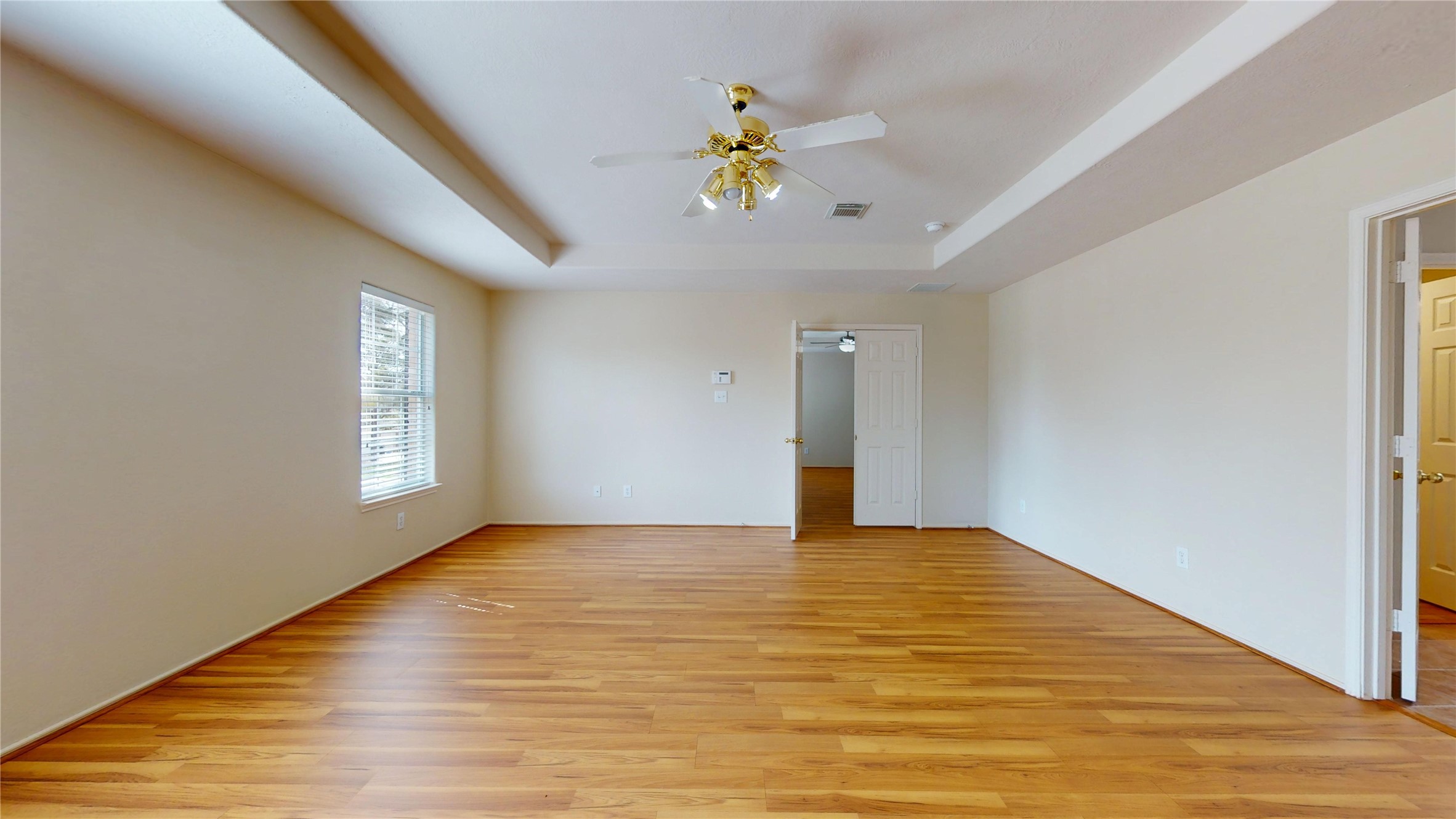 18226 Thicket Grove Road Houston, TX 77084 - Photo 25 of 45 a view of an empty room with a window