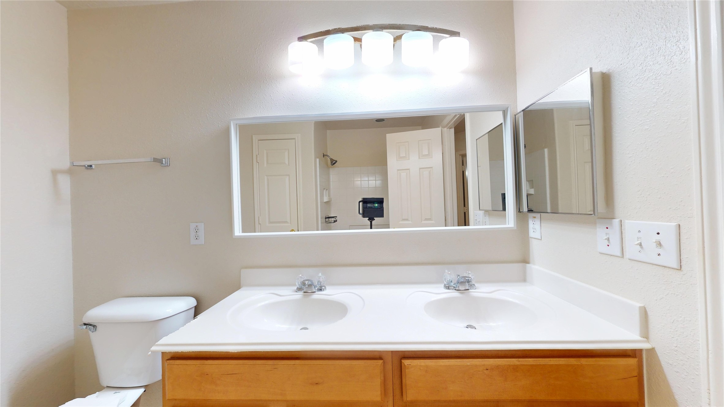 18226 Thicket Grove Road Houston, TX 77084 - Photo 36 of 45 a bathroom with a sink and a mirror