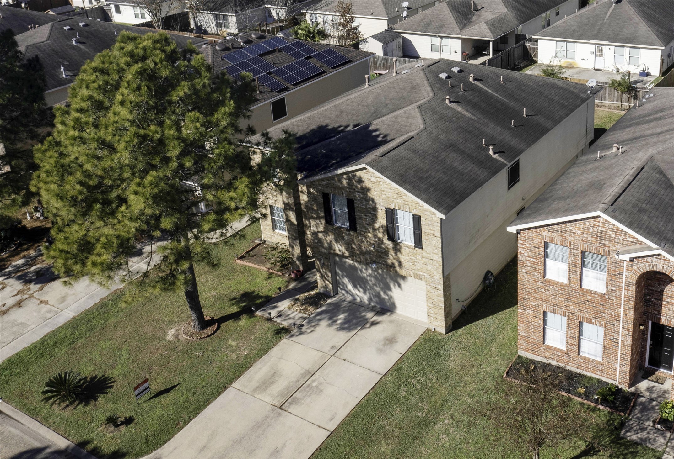 18226 Thicket Grove Road Houston, TX 77084 - Photo 43 of 45 an aerial view of a house with a yard
