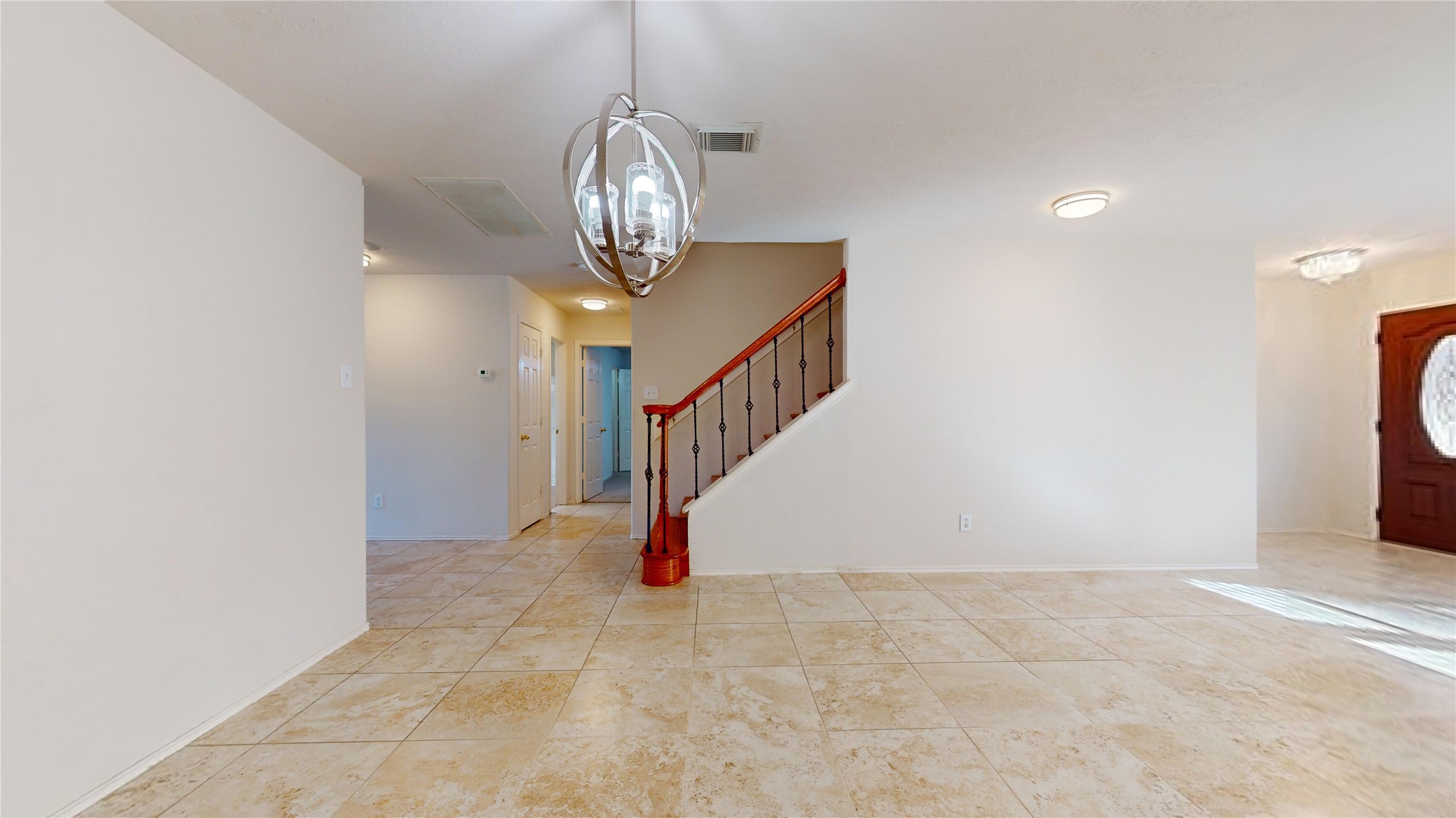 18226 Thicket Grove Road Houston, TX 77084 - Photo 5 of 45 a view of entryway and hall with a front door