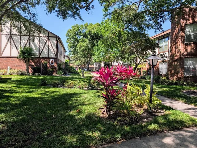 a view of a yard with a fountain
