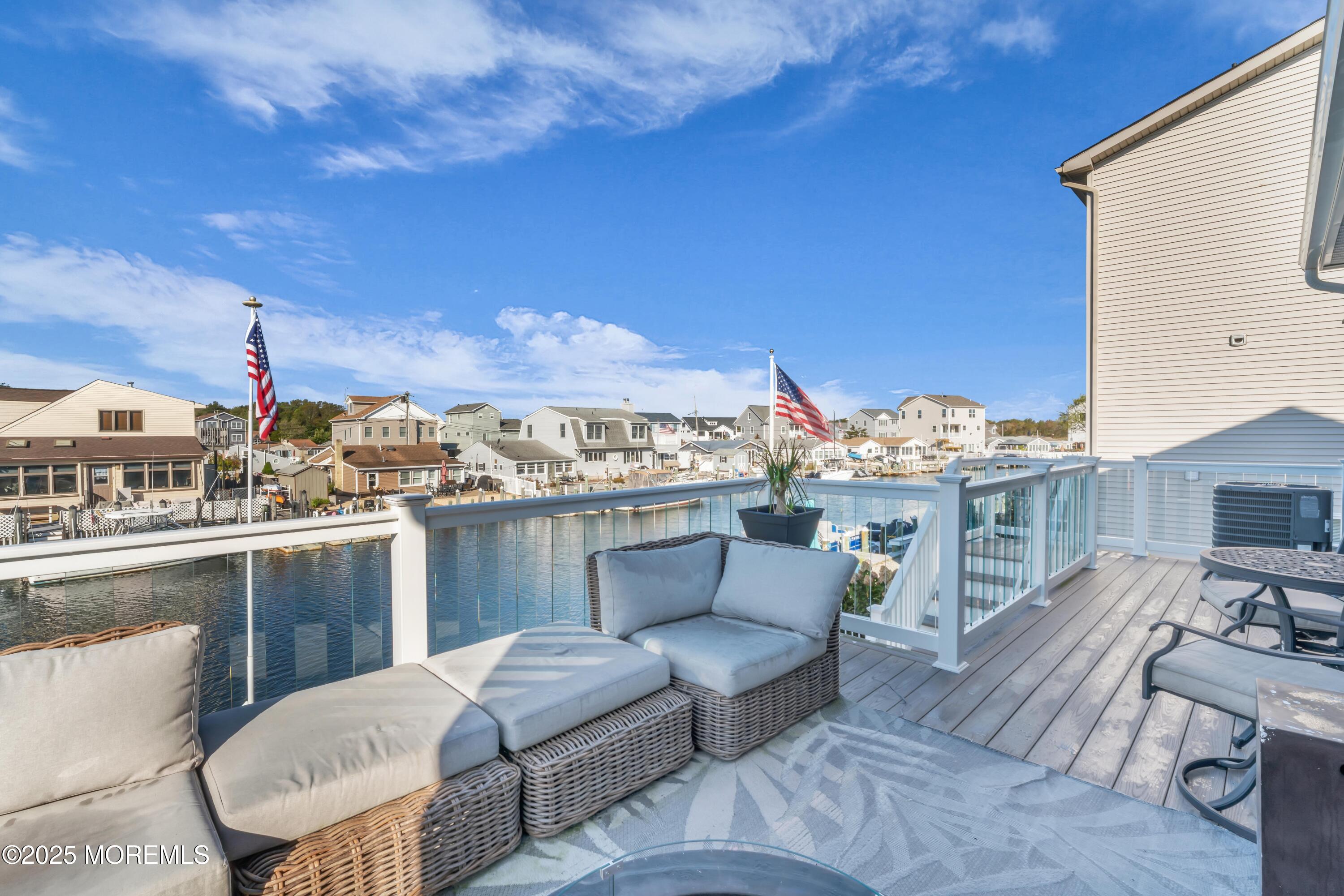 21 Compass Road Waretown, NJ 08758 - Photo 17 of 46 a view of roof deck with furniture