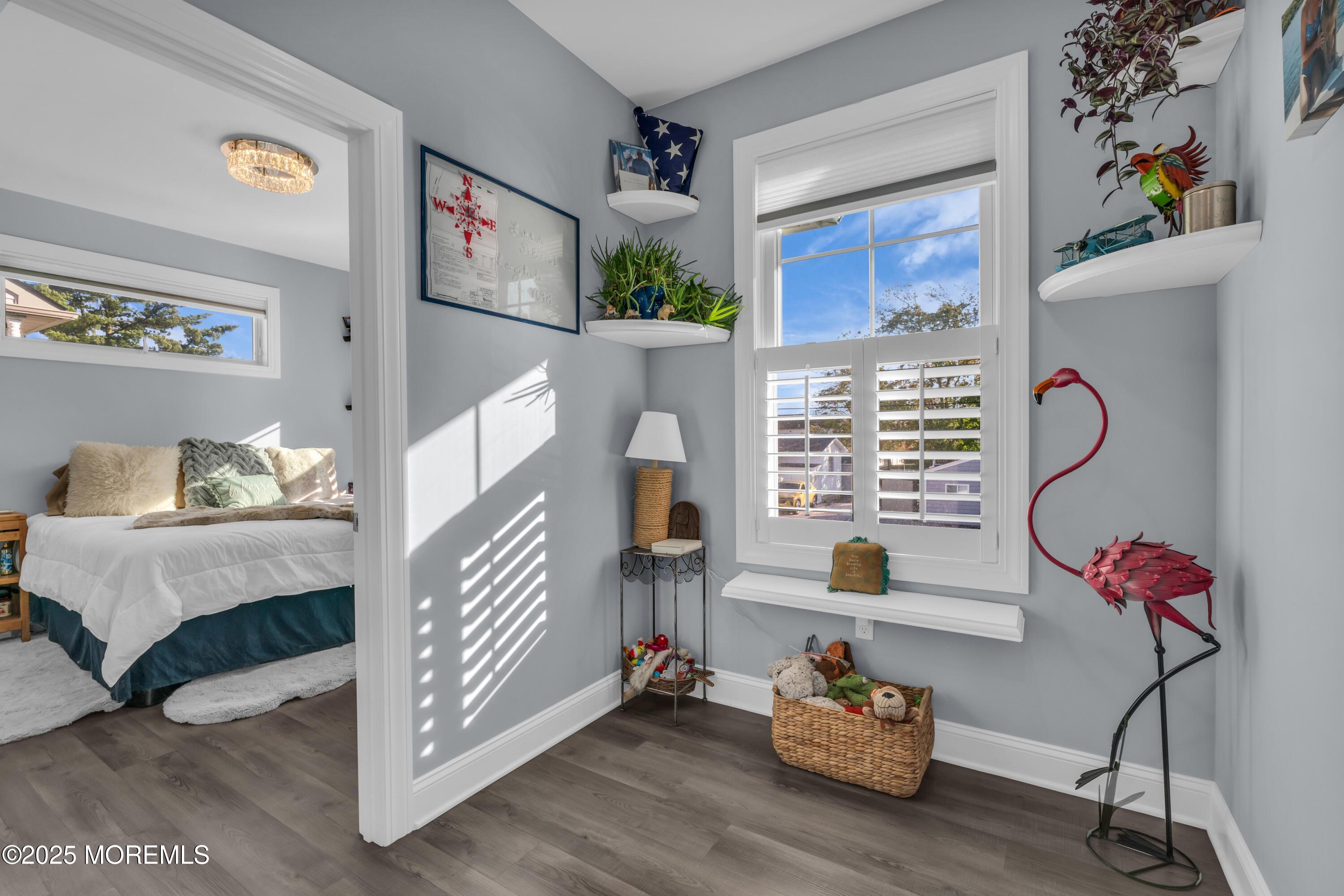 21 Compass Road Waretown, NJ 08758 - Photo 21 of 46 a living room with furniture and a window