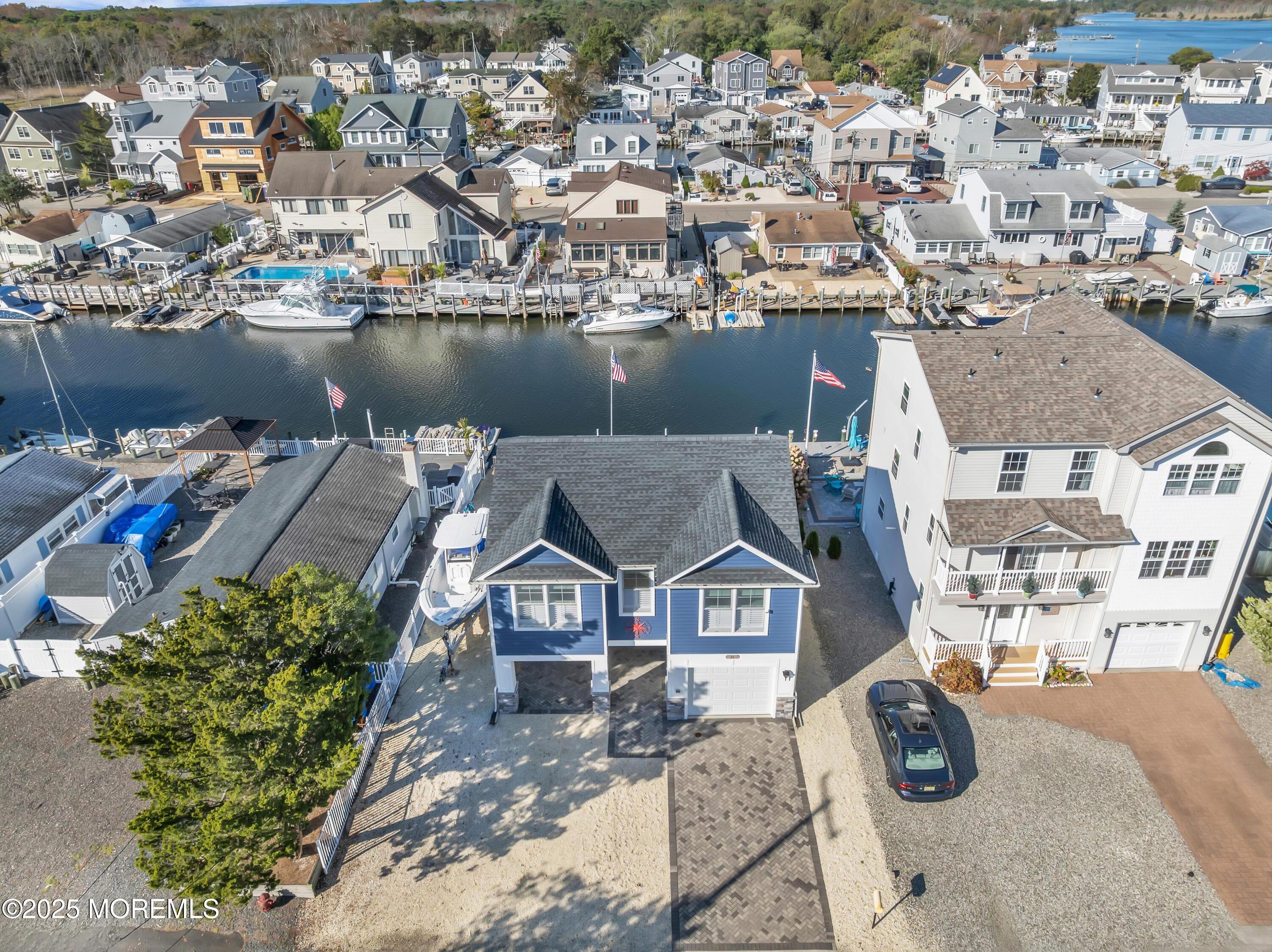 21 Compass Road Waretown, NJ 08758 - Photo 3 of 46 an aerial view of a house with outdoor space