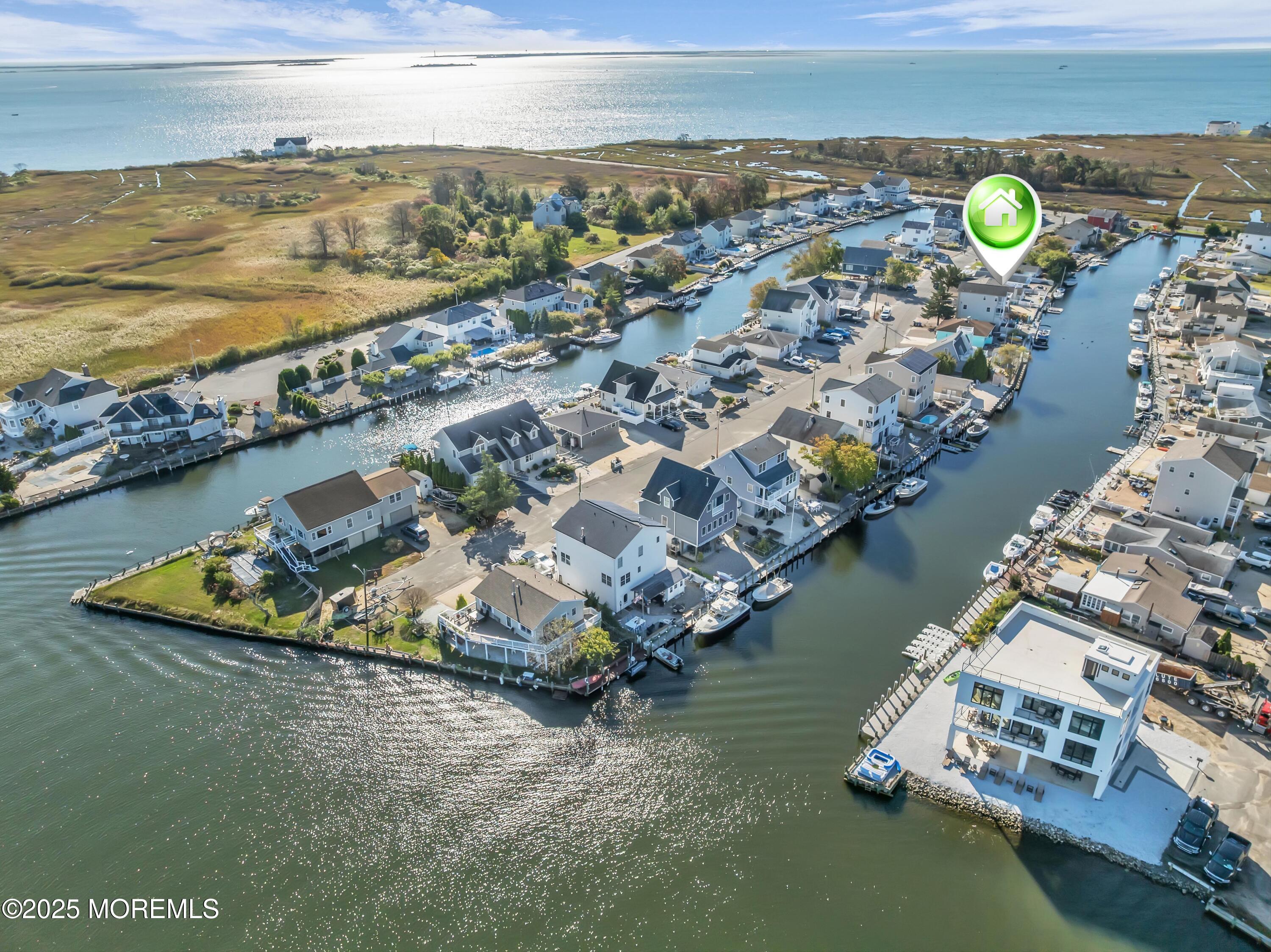 21 Compass Road Waretown, NJ 08758 - Photo 38 of 46 an aerial view of a house with a ocean view