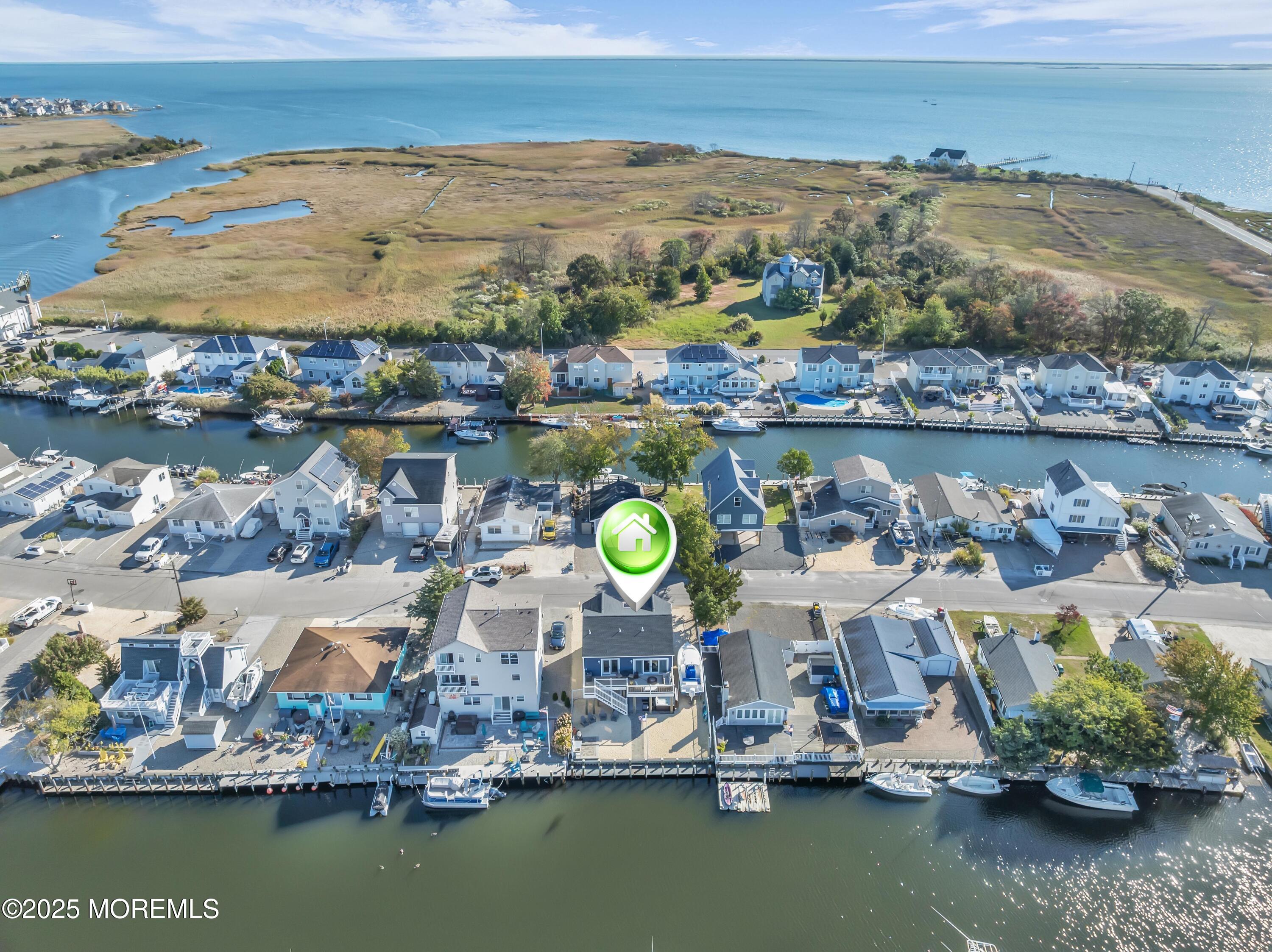 21 Compass Road Waretown, NJ 08758 - Photo 5 of 46 a view of a city with ocean view