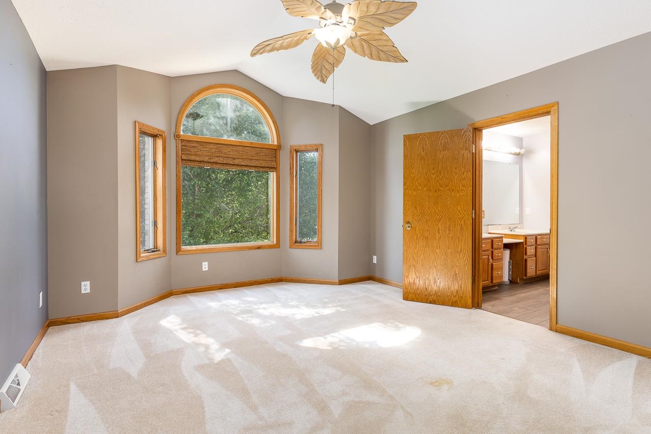 4661 North Marrill Road Byron, IL 61010 - Photo 15 of 39 a view of an empty room with a window
