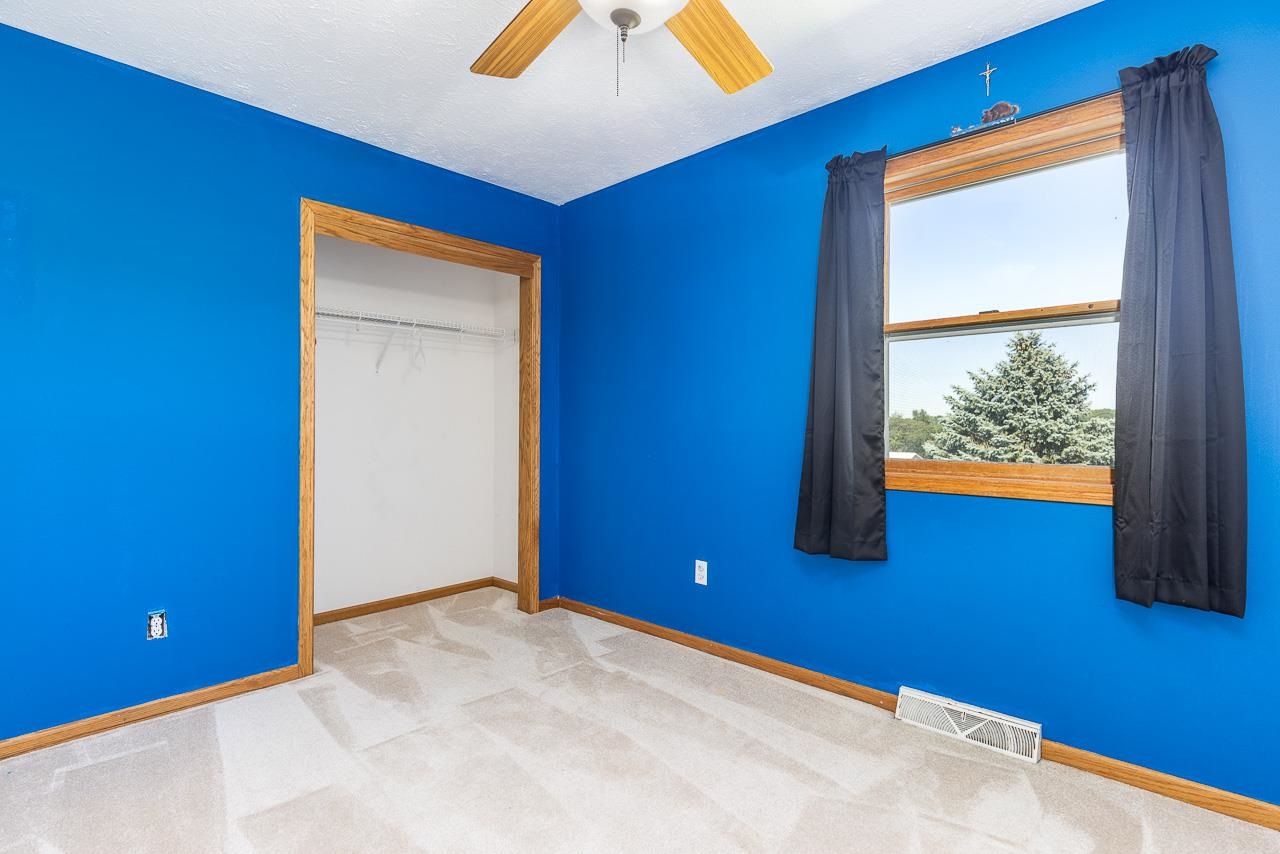 4661 North Marrill Road Byron, IL 61010 - Photo 23 of 39 a view of an empty room with a window