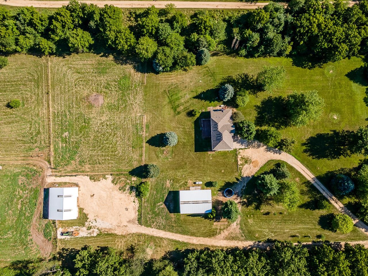 4661 North Marrill Road Byron, IL 61010 - Photo 36 of 39 an aerial view of residential houses with outdoor space