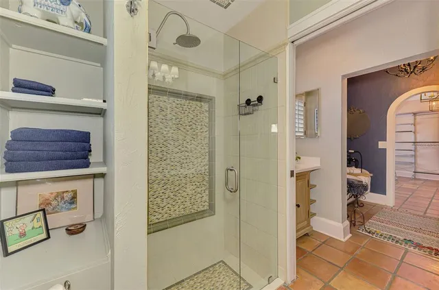 a view of a chairs and table in the patio