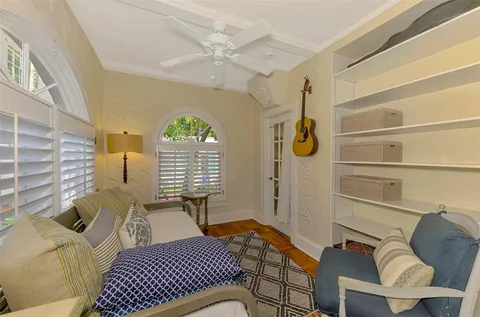 a view of a chair and table in the patio