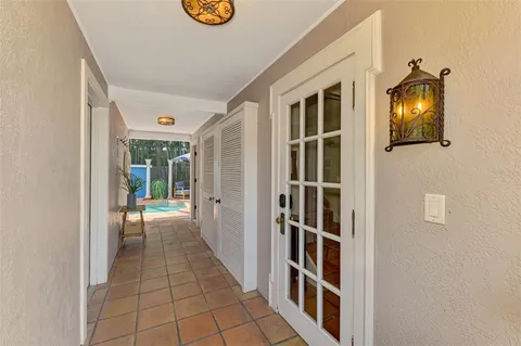 a view of a livingroom with furniture and a window