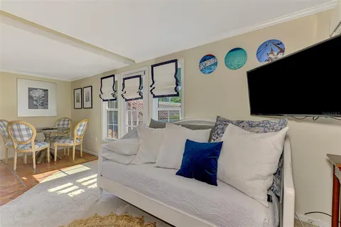 a kitchen with stainless steel appliances a stove and a microwave