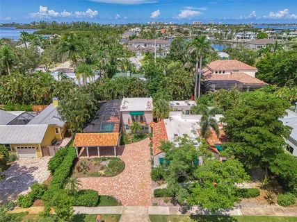 an aerial view of a house with a garden