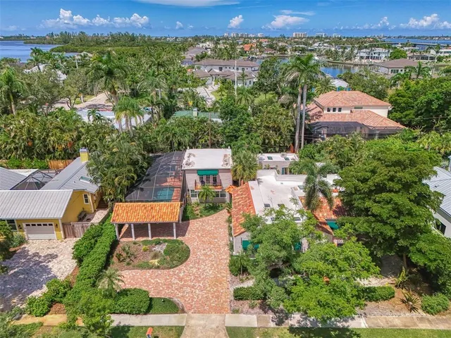 an aerial view of a house with a garden