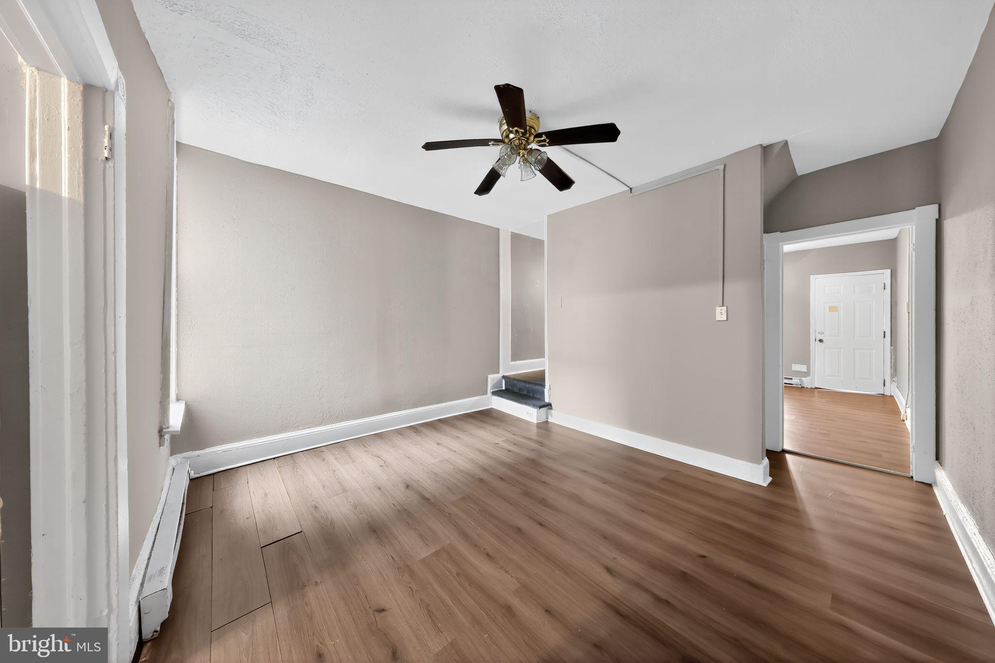 11 East 24th Street Wilmington, DE 19802 - Photo 13 of 31 a view of empty room with wooden floor